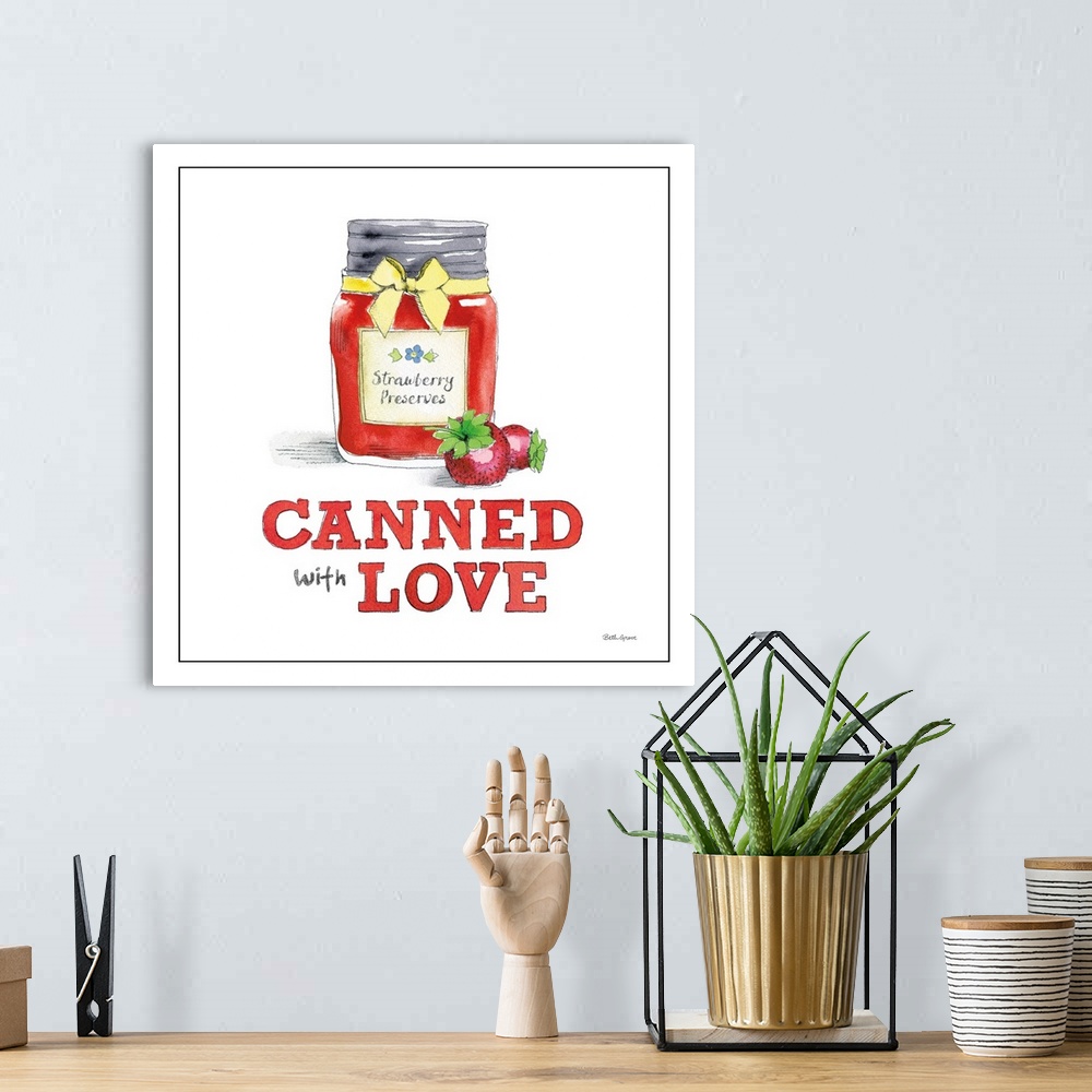 A bohemian room featuring Square kitchen decor with an illustration of strawberry jam/jelly and the text "Canned With Love"...