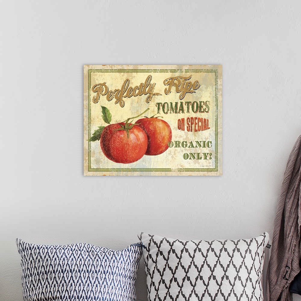 A bohemian room featuring Contemporary artwork of a vintage looking sign with tomatoes to the left of the image and text to...