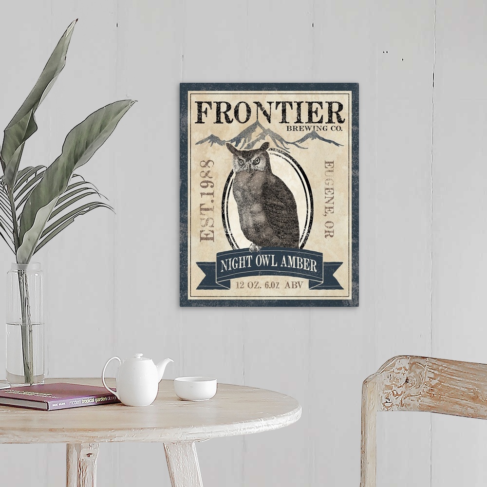 A farmhouse room featuring Contemporary artwork of a wilderness themed brewery sign.