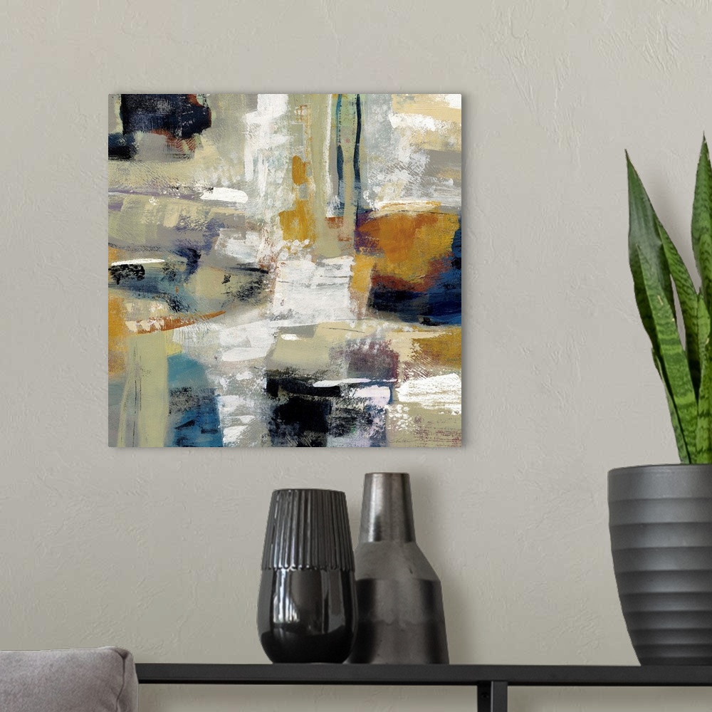 A modern room featuring Square abstract painting with bold colors and brushstrokes.