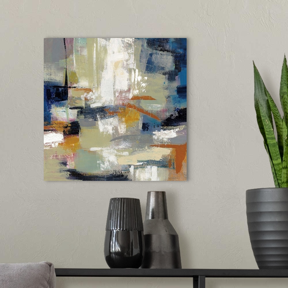 A modern room featuring Square abstract painting with bold colors and brushstrokes.