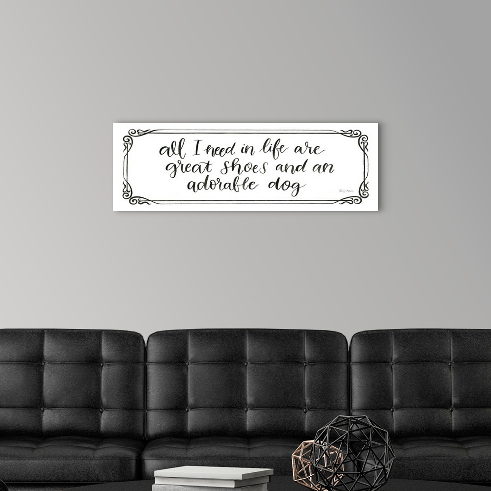A modern room featuring Humorous artwork featuring the words, 'All I need in life are great shoes and an adorable dog'.