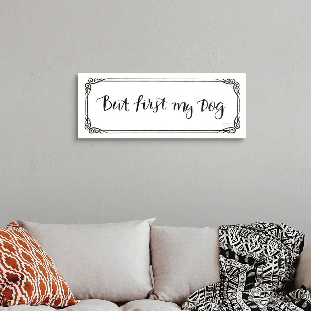 A bohemian room featuring Humorous artwork featuring the words, 'But first, my dog'.