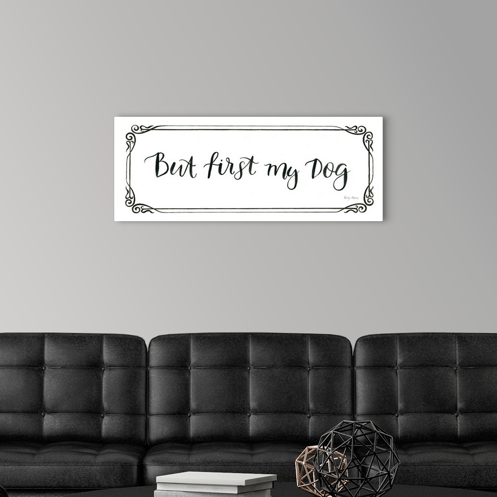 A modern room featuring Humorous artwork featuring the words, 'But first, my dog'.