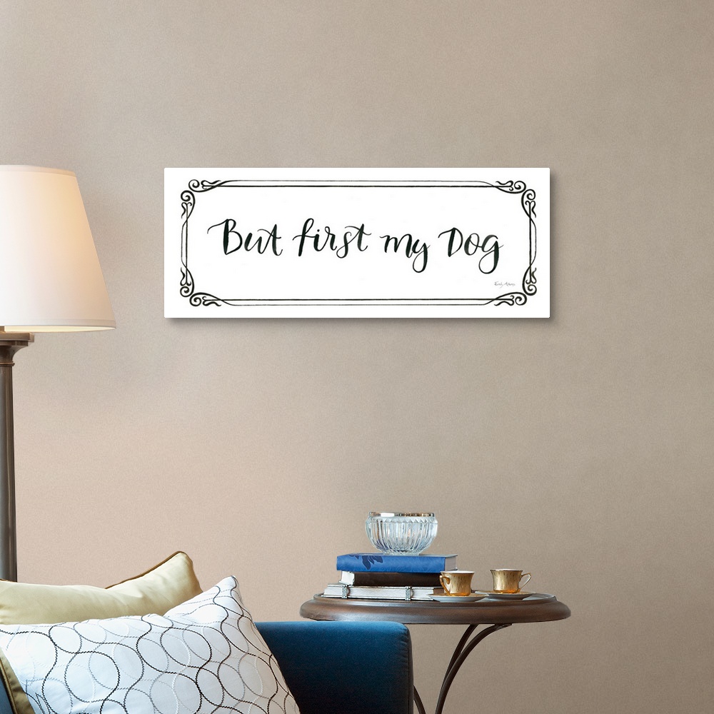 A traditional room featuring Humorous artwork featuring the words, 'But first, my dog'.