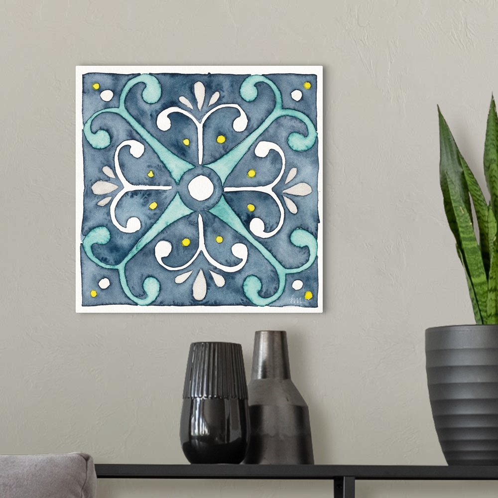A modern room featuring A square watercolor floral design in the style of tile in varies shades of blue.