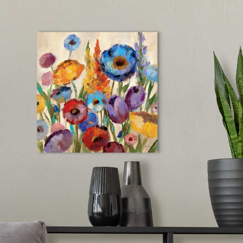 A modern room featuring Square, oversized wall painting of a large variety group of flowers in assorted colors on a tan b...