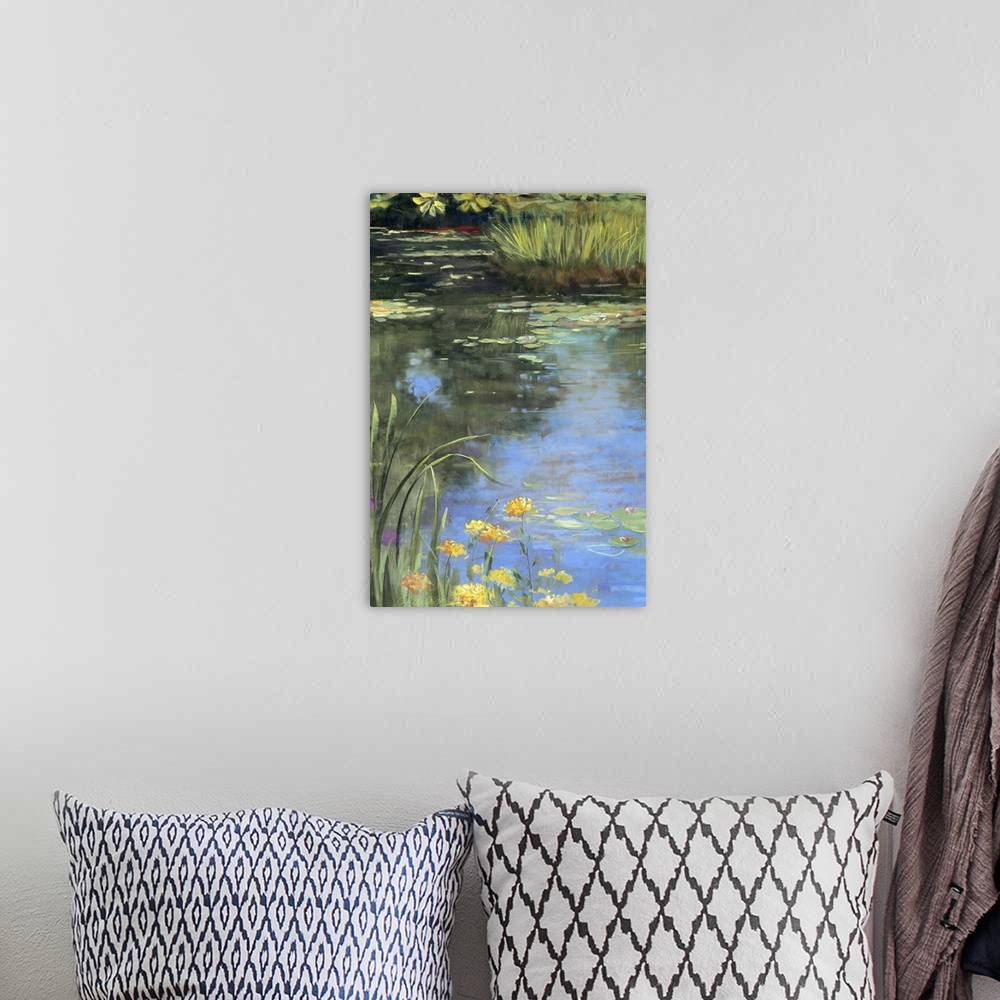 A bohemian room featuring Contemporary docor painting of water lilies and lily pads in a small pond, with the water reflect...