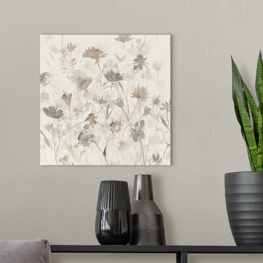 A modern room featuring Square abstract watercolor painting of neutral and gray toned flower silhouettes.