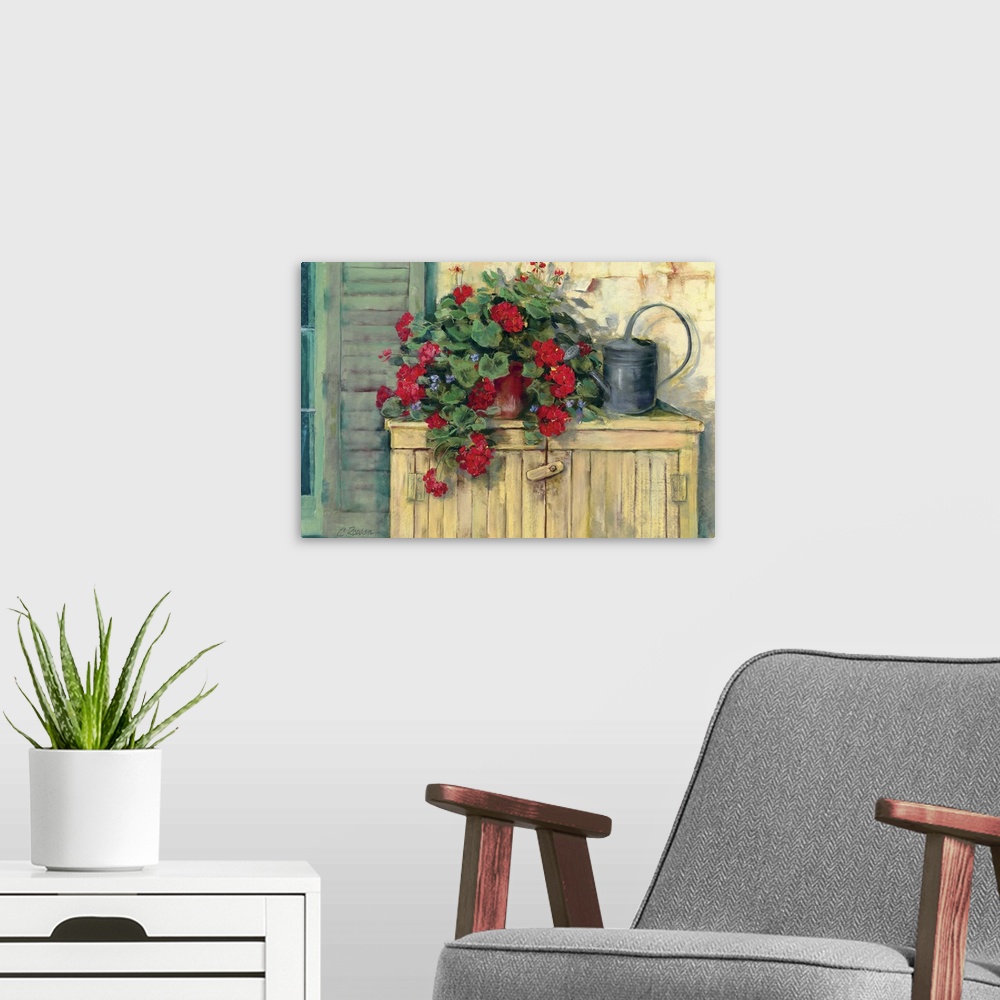 A modern room featuring Contemporary painting of a potted plant and an old-fashioned watering can on a wooden storage cra...