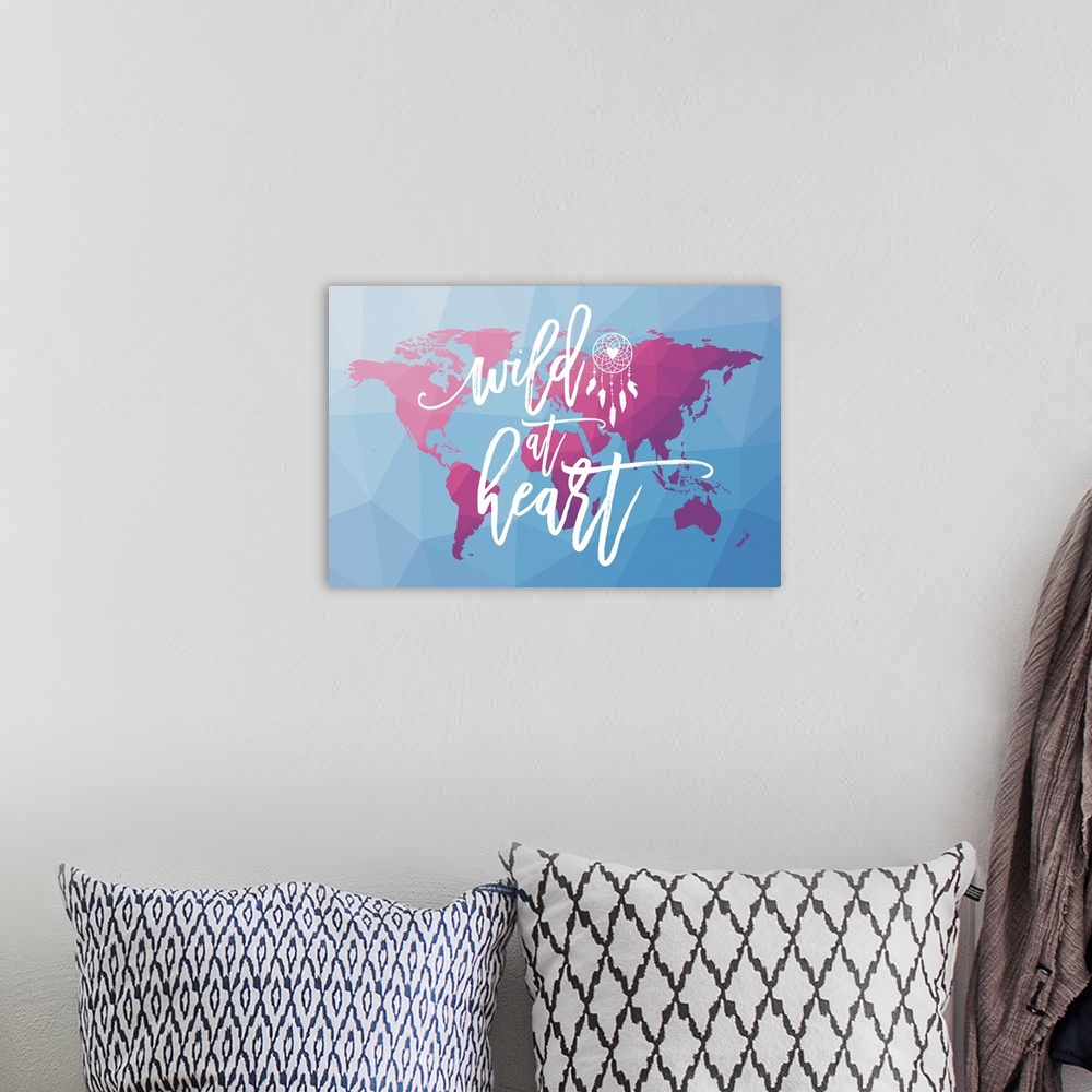 A bohemian room featuring Geometric map of the World in purple and pink tones on a blue background with "Wild at Heart" han...