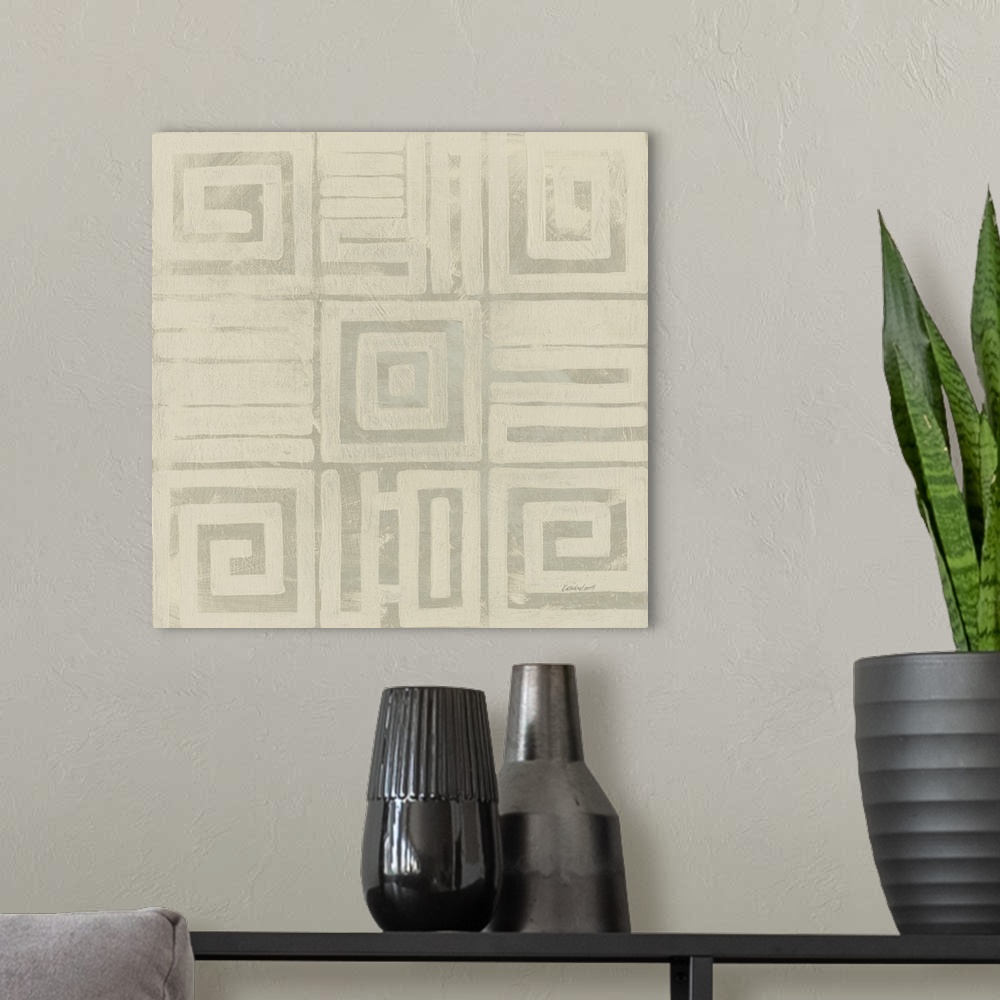 A modern room featuring Square abstract art created with neutral two toned colors and geometric shapes.