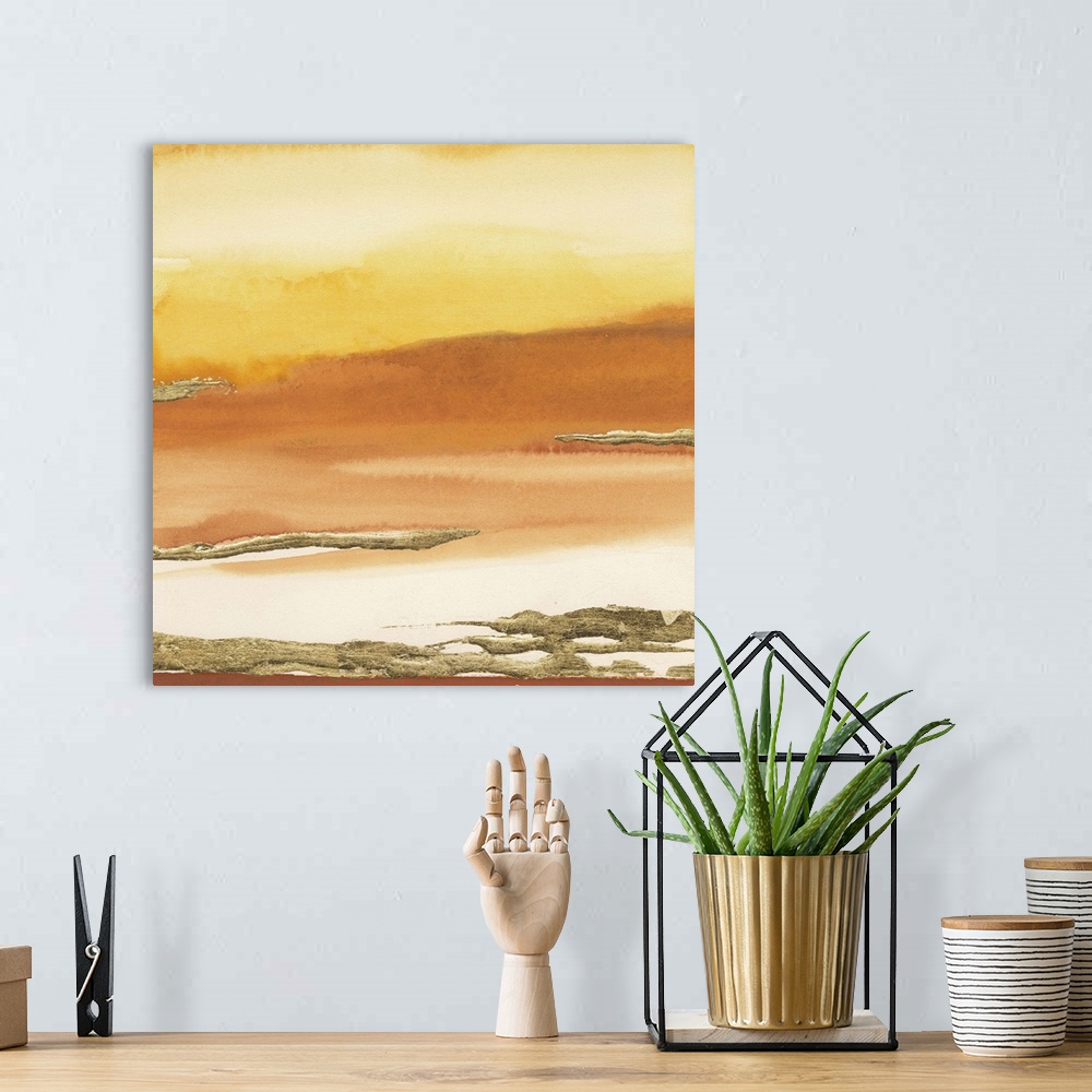 A bohemian room featuring Warm toned yellow and orange horizontal gradient watercolor painting with metallic gold texture.