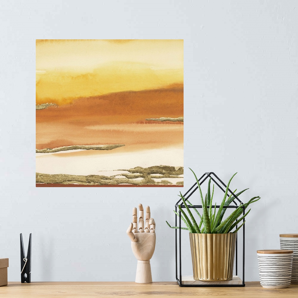 A bohemian room featuring Warm toned yellow and orange horizontal gradient watercolor painting with metallic gold texture.