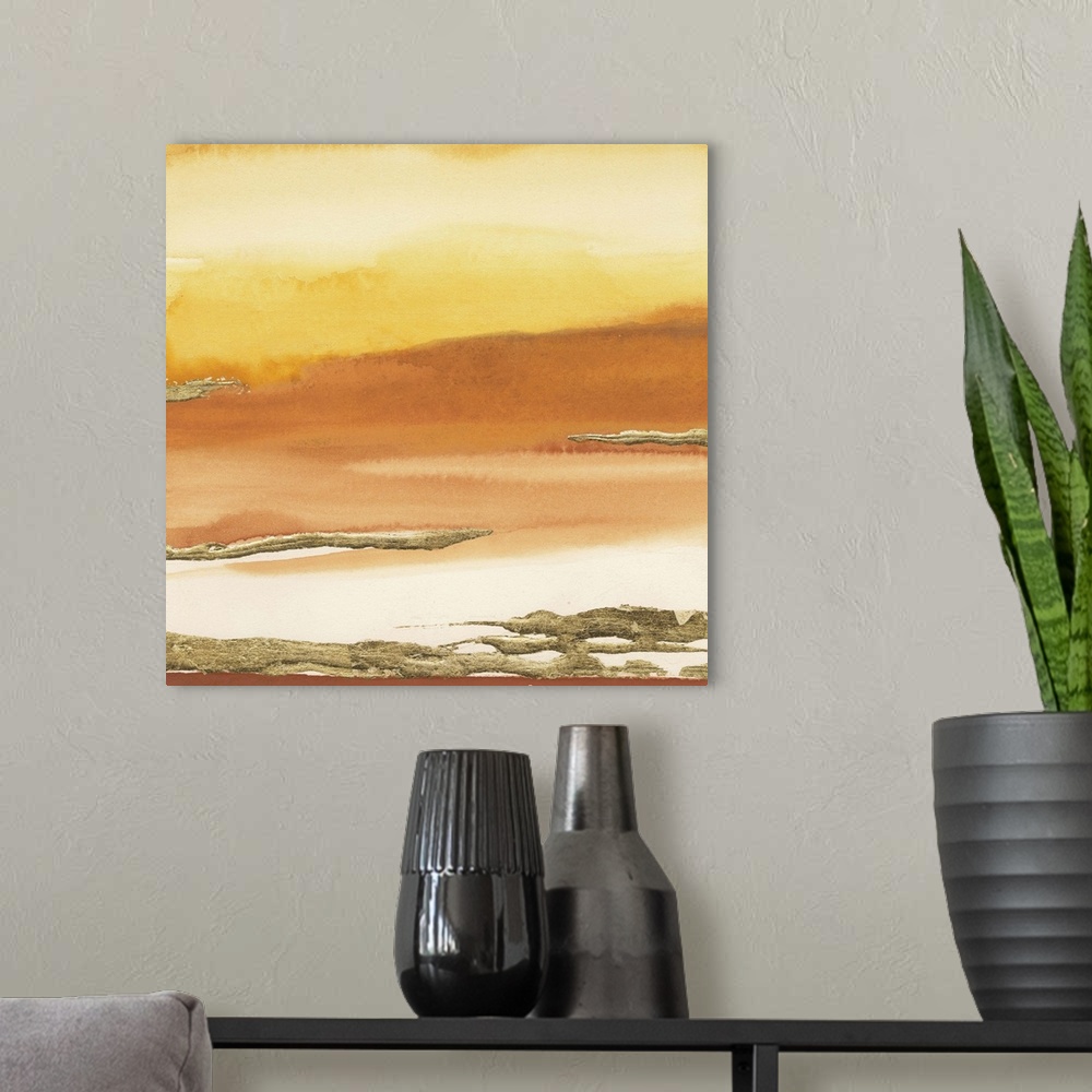 A modern room featuring Warm toned yellow and orange horizontal gradient watercolor painting with metallic gold texture.