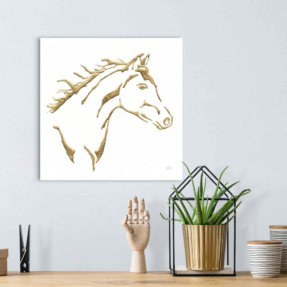 A bohemian room featuring Metallic gold outlined illustration of a horse on a  square solid white background.
