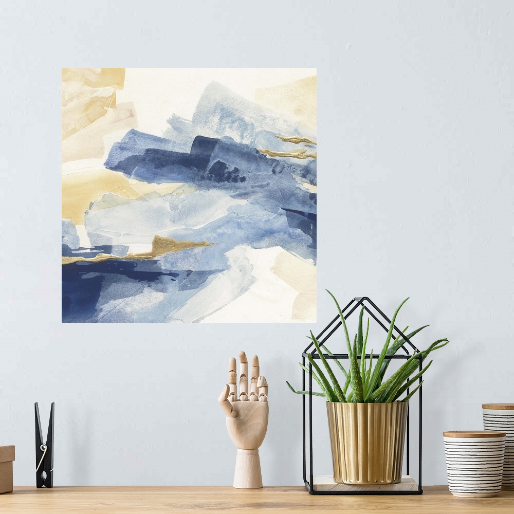 A bohemian room featuring Abstract contemporary painting with broad strokes of blue and gold.