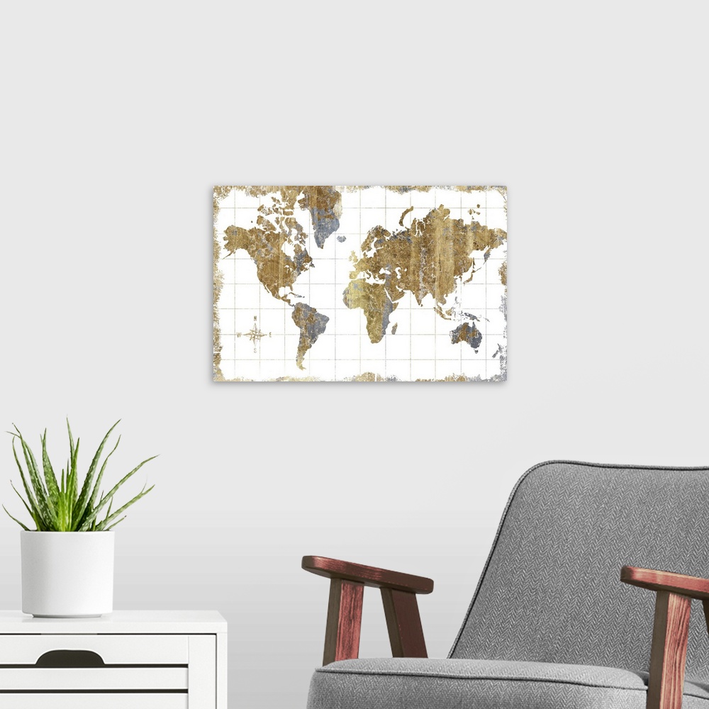 A modern room featuring A world map with a compass rose done in metallic tones.
