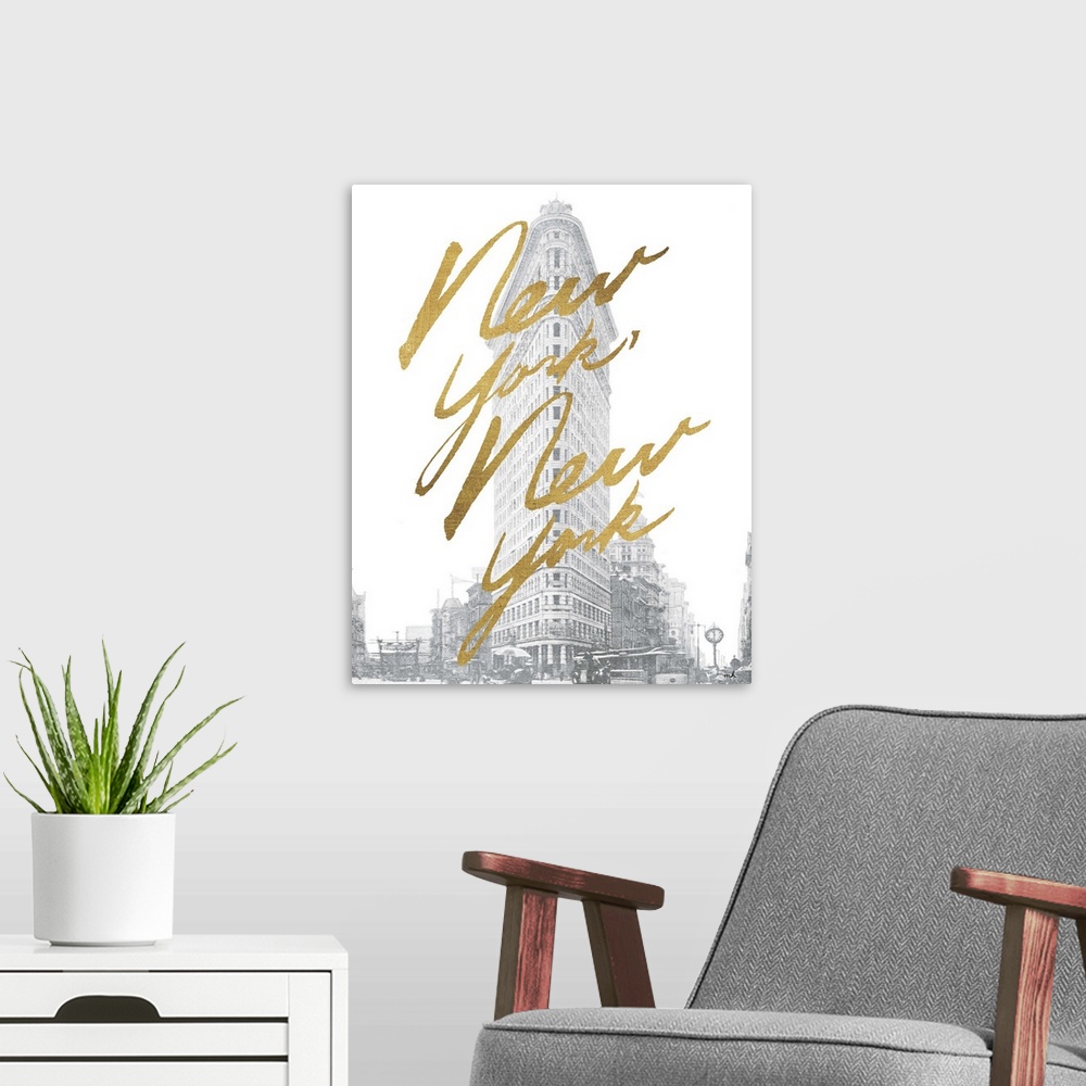 A modern room featuring Gold handlettering against a muted black and white photograph of the flat iron building in New Yo...