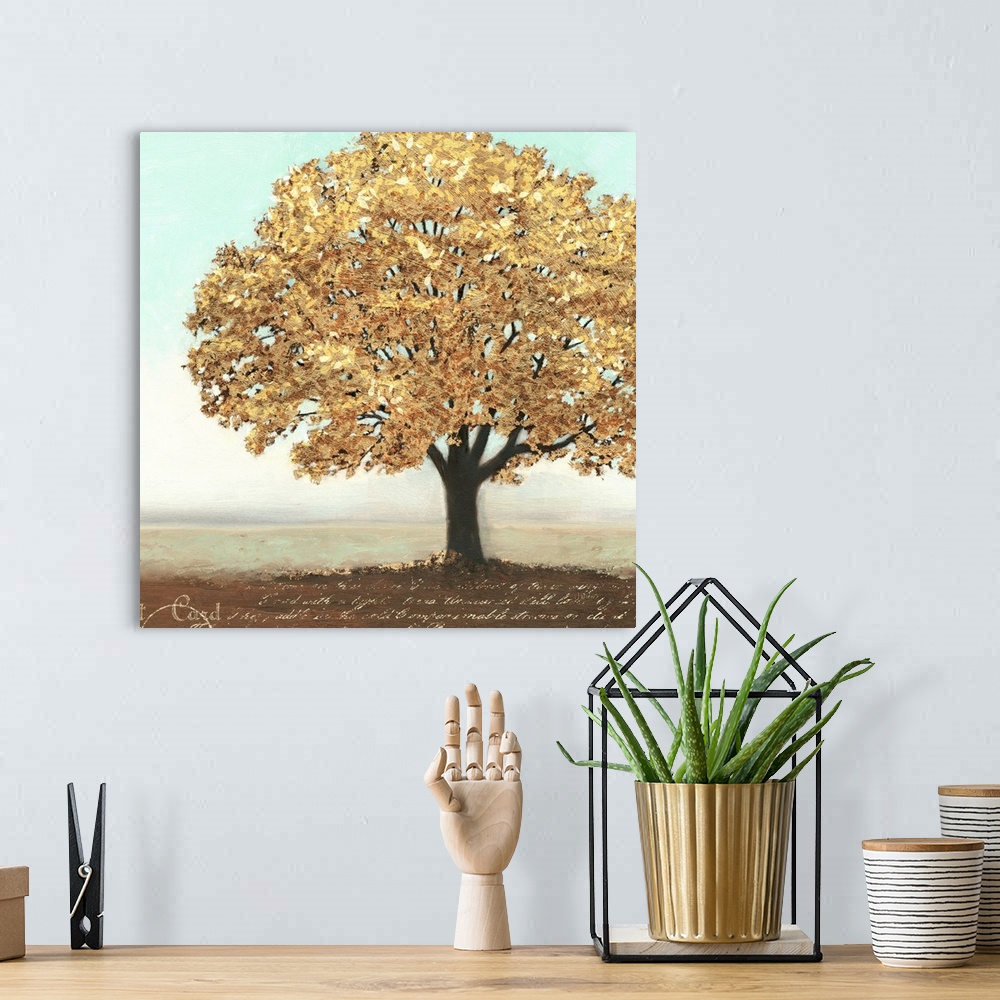 A bohemian room featuring Contemporary artwork of a gold leaved tree with script below it.