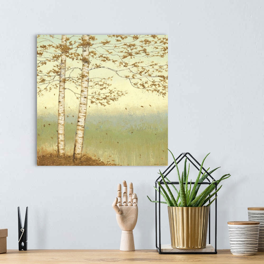 A bohemian room featuring Serene painting of two trees with long, leafy branches at the edge of a valley in pastel shades.