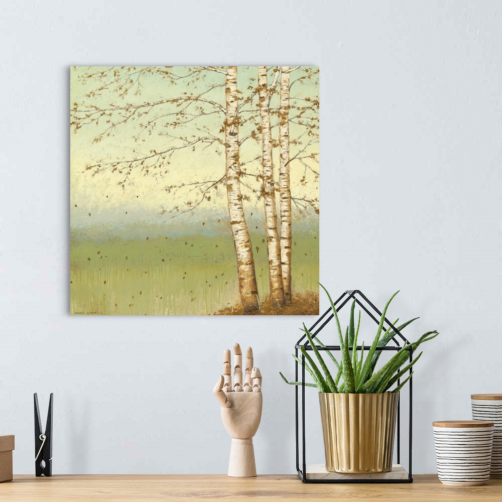 A bohemian room featuring Square painting on a giant wall hanging of several birch trees dropping what's left of their gold...