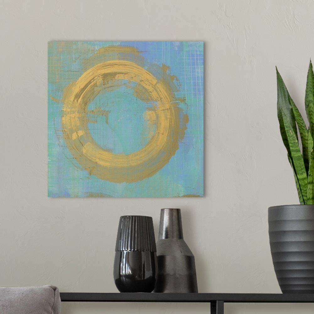 A modern room featuring Contemporary gold and blue abstract home decor artwork.