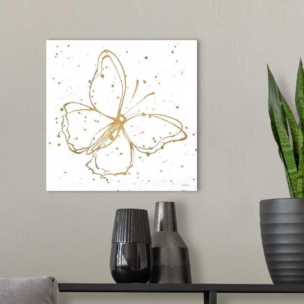 A modern room featuring Square painting of a metallic gold butterfly with paint splatter on a solid white background.