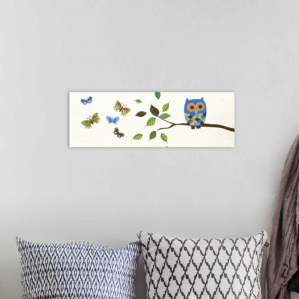 A bohemian room featuring Contemporary artwork of an owl in multiple colors perched on a branch.