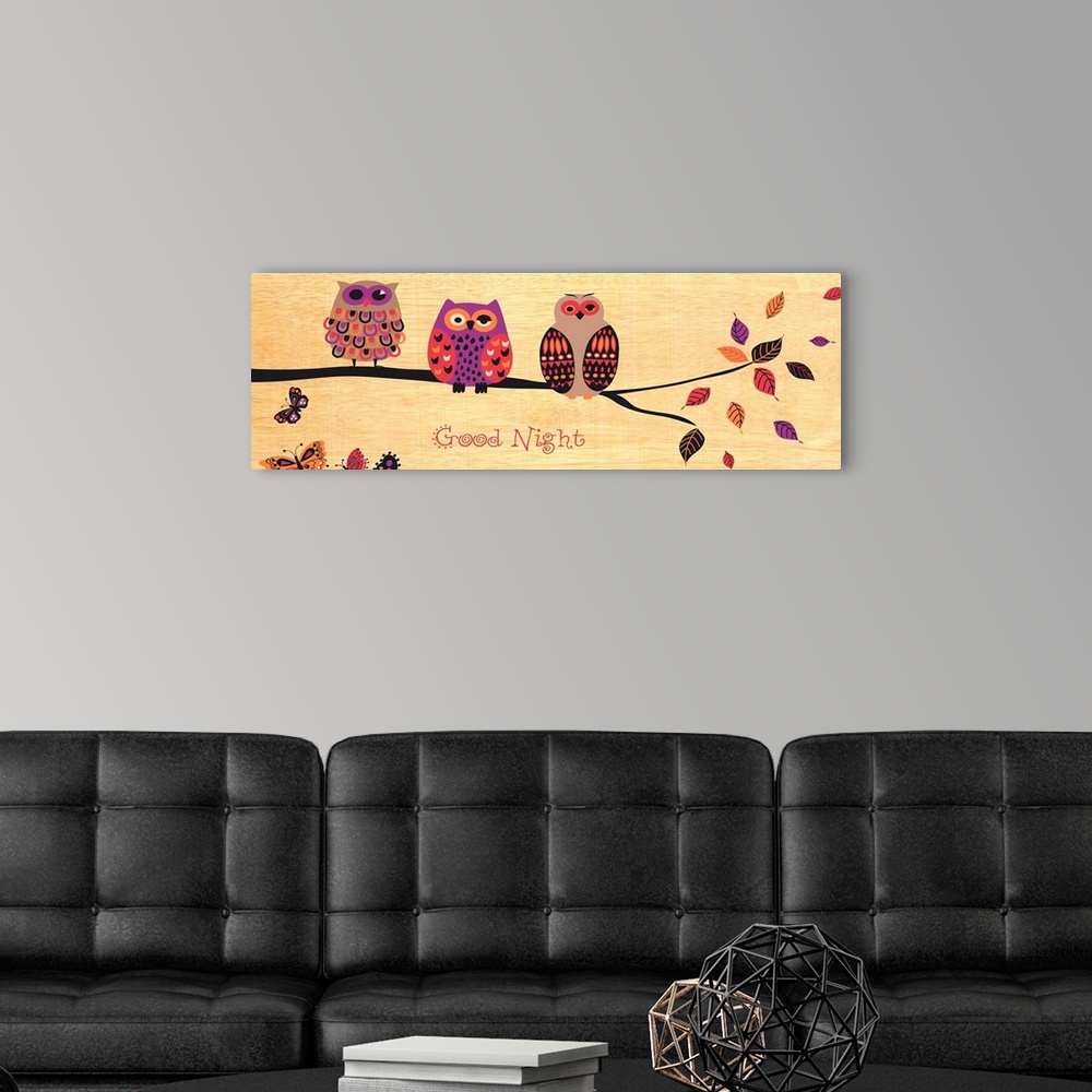 A modern room featuring Three decorative owls on a branch atop a wood grain background with the words ""Good Night"" belo...