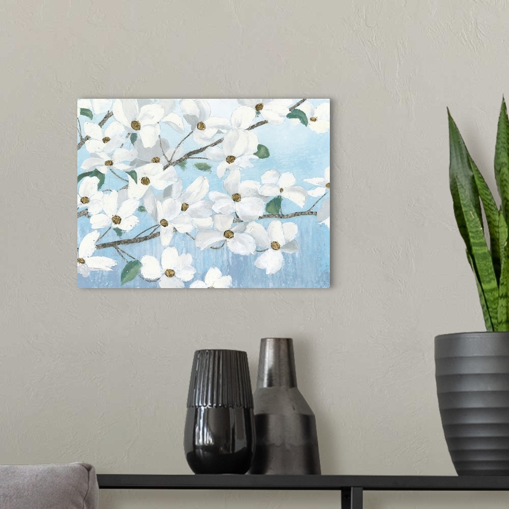 A modern room featuring Contemporary painting of dogwood flowers with a light blue background.