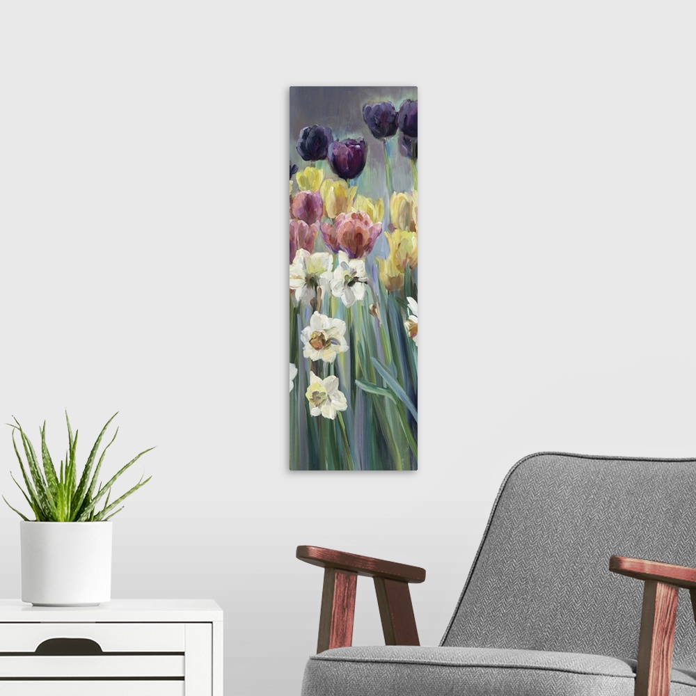 A modern room featuring Contemporary painting of multi-colored flowers in a garden.