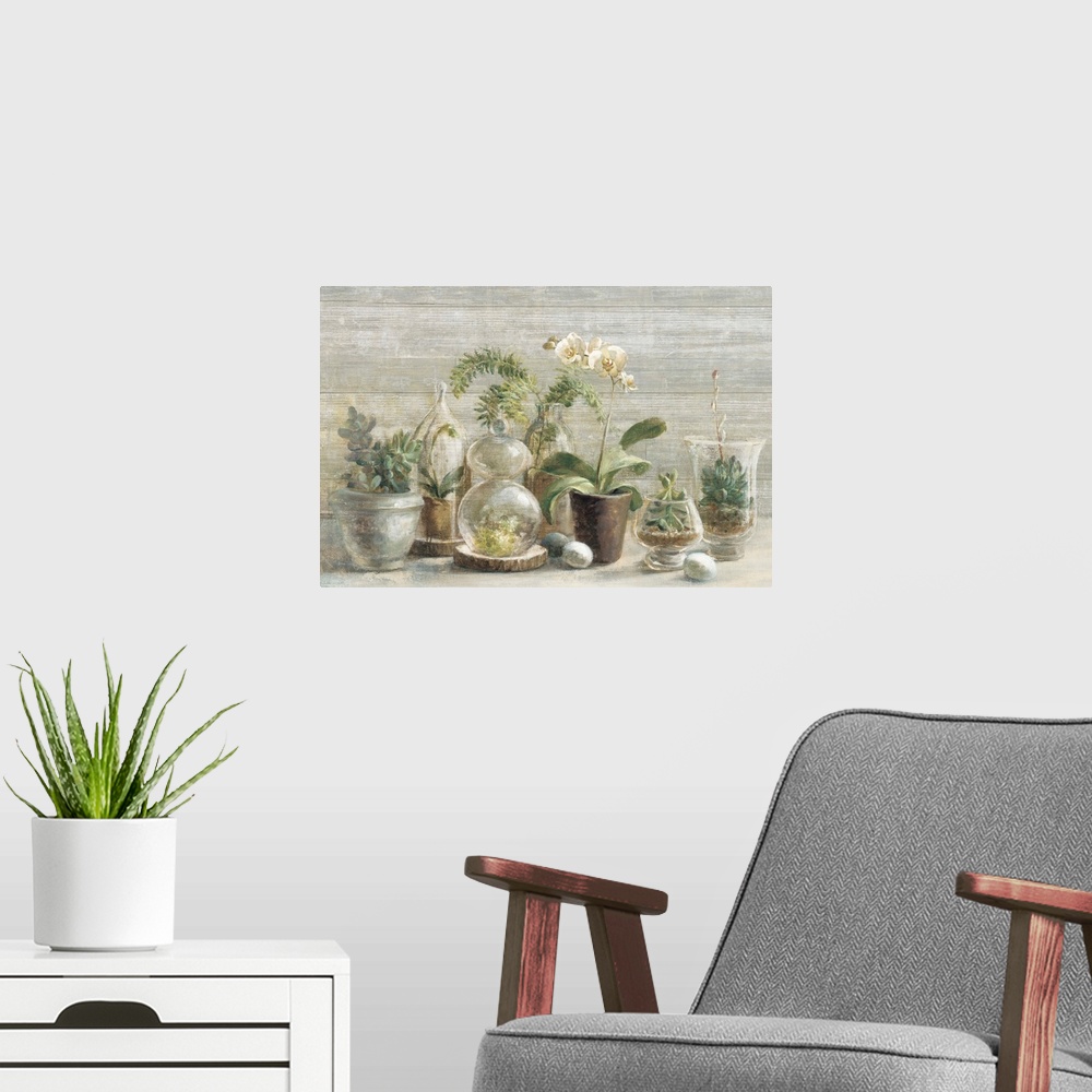 A modern room featuring Contemporary still life painting of potted orchids and small terrariums.