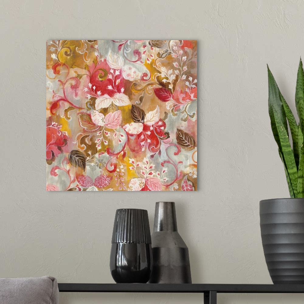A modern room featuring Square painting of pink, white, and brown leaves and flowers with a red, gold, and grey background.