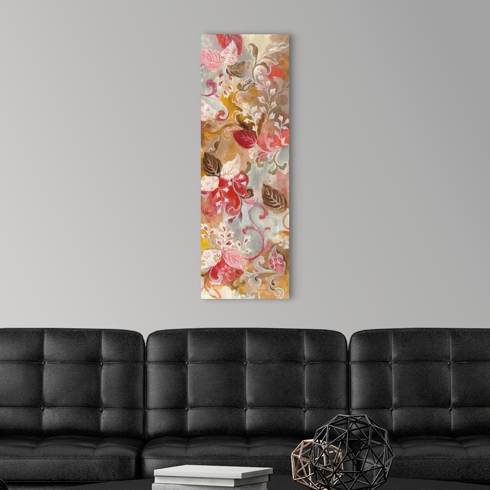 A modern room featuring Tall painting of pink, white, and brown leaves and flowers with a red, gold, and grey background.