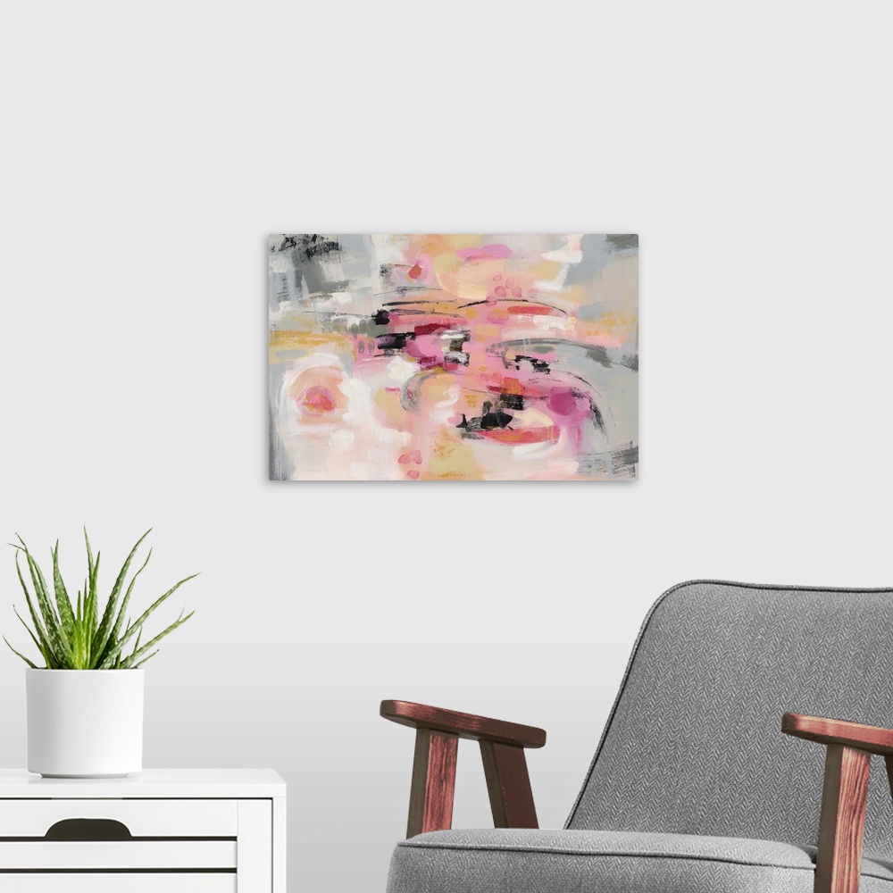 A modern room featuring A horizontal abstract image in shades of pink, yellow and gray.