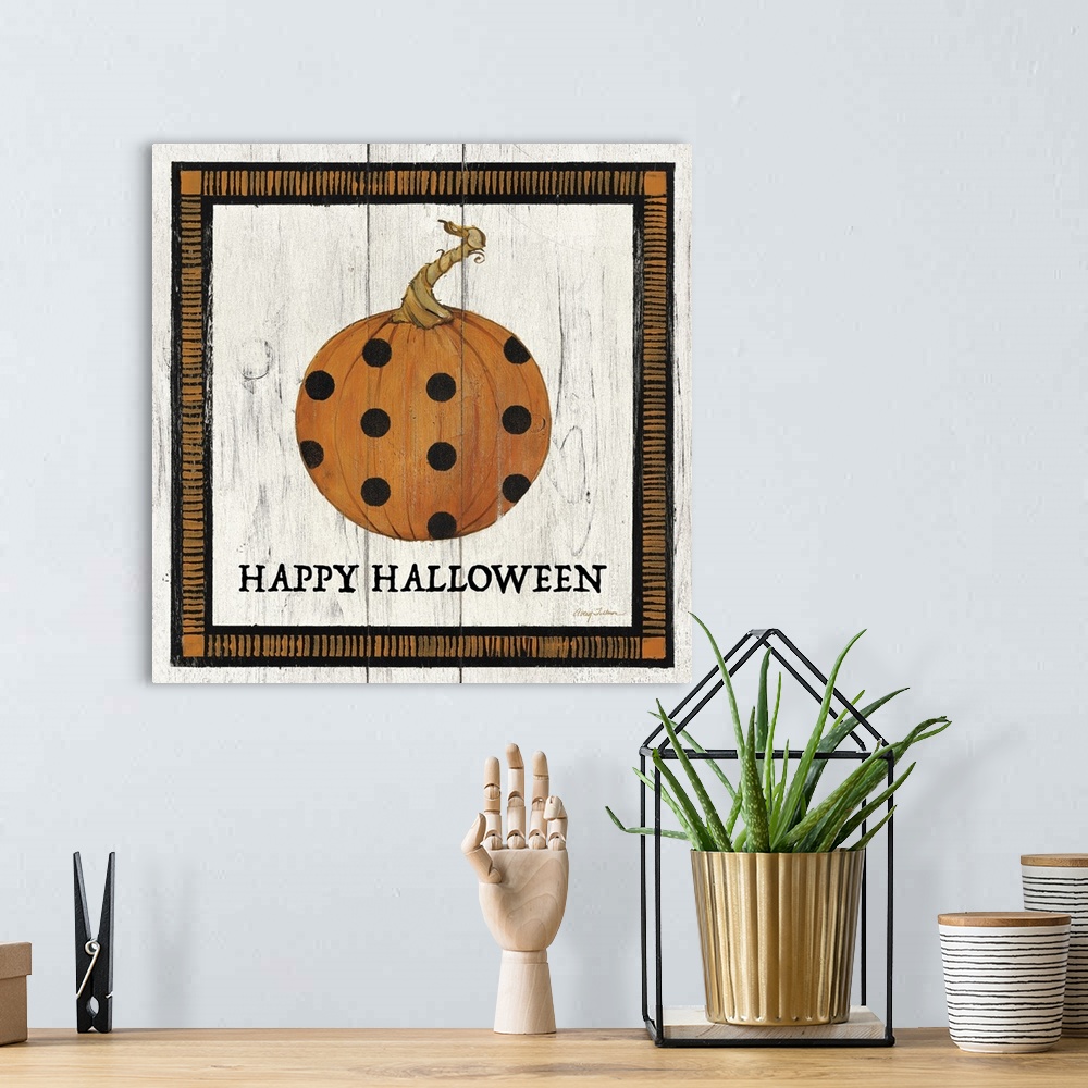 A bohemian room featuring Happy Halloween Pumpkin