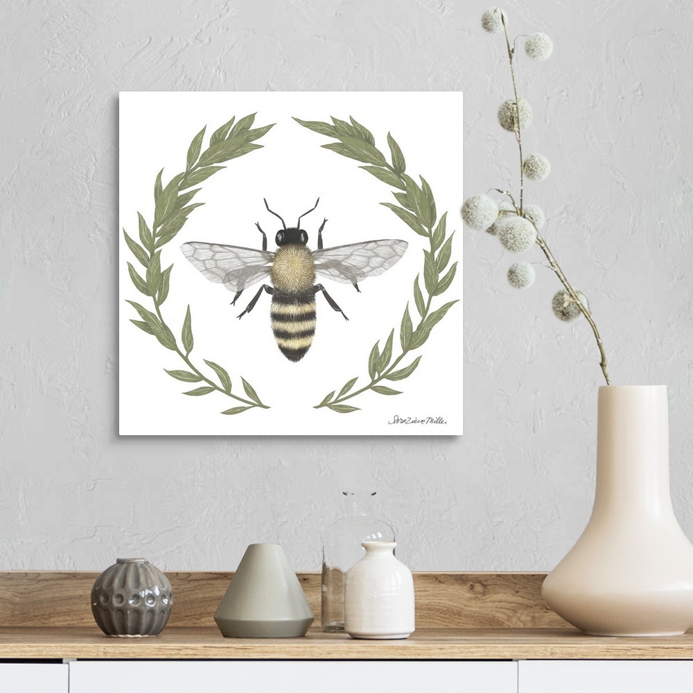 A farmhouse room featuring Square illustration of a bumblebee framed with a wreath of leaves.