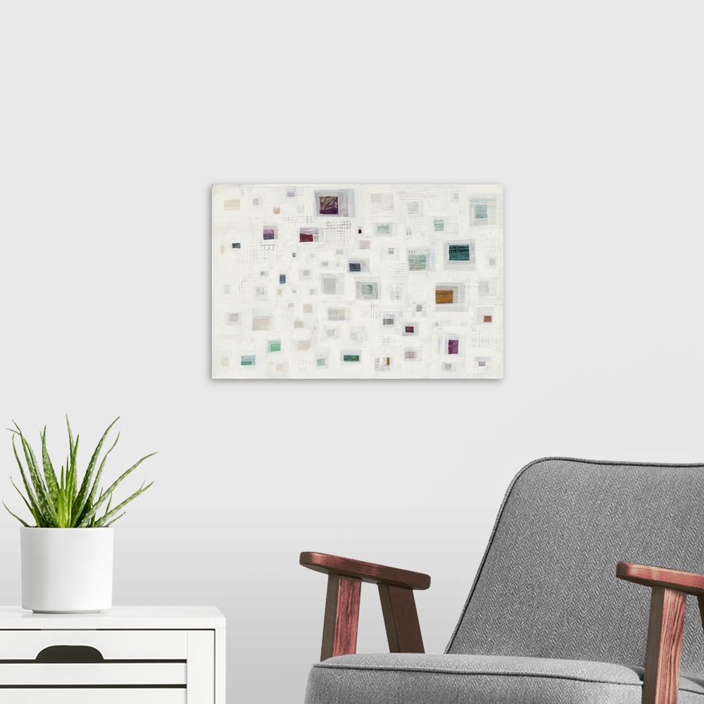 A modern room featuring Contemporary abstract artwork of squares and rectangles in different colors against a neutral col...