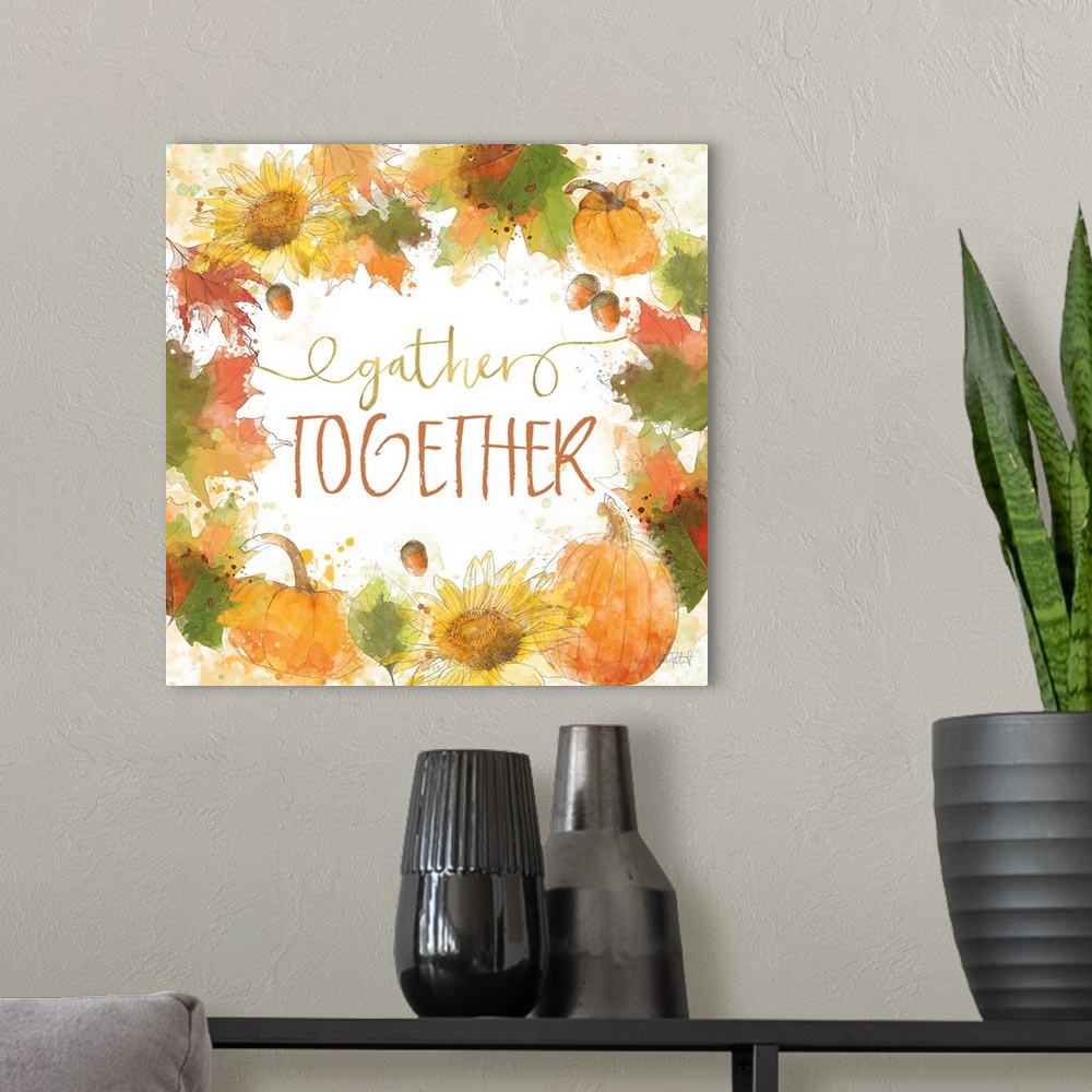 A modern room featuring "Gather Together" written inside a harvest wreath with Fall leaves, acorns, sunflowers, and pumpk...