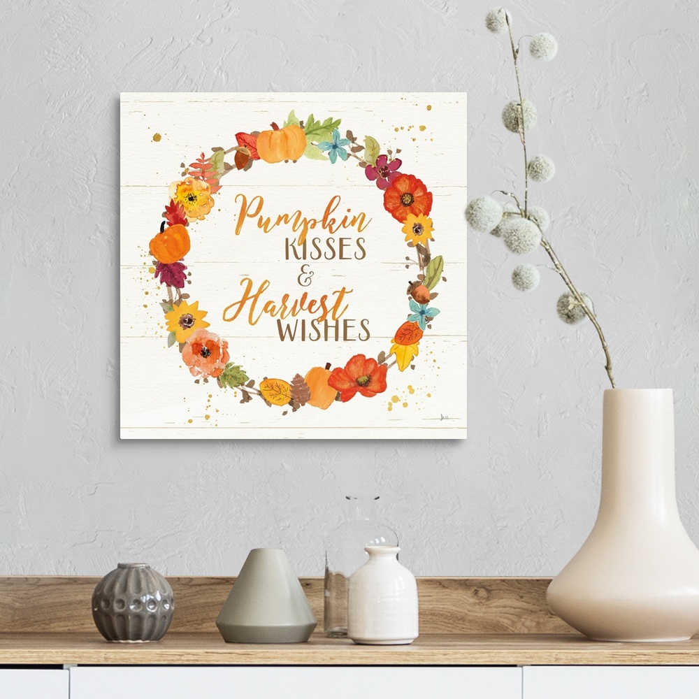 A farmhouse room featuring Decorative artwork of the words "Pumpkin Kisses and Harvest Wishes" surrounded by a wreath and a ...