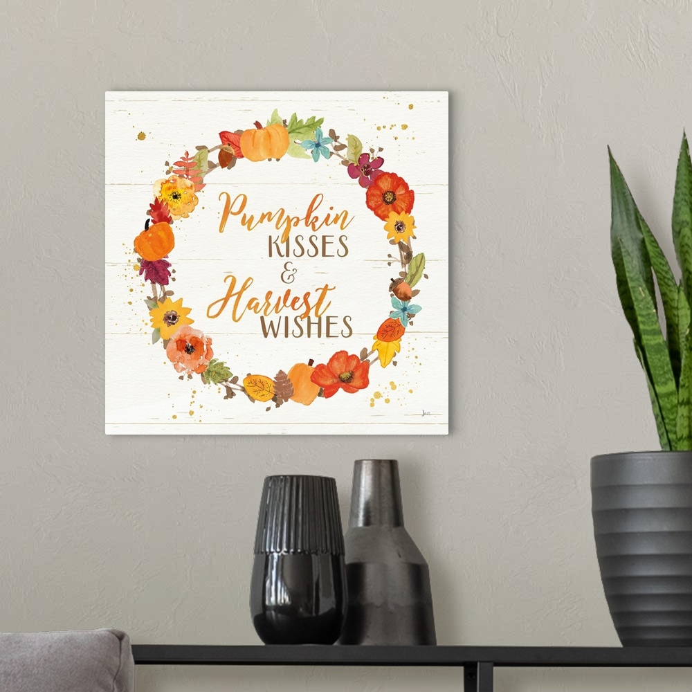 A modern room featuring Decorative artwork of the words "Pumpkin Kisses and Harvest Wishes" surrounded by a wreath and a ...