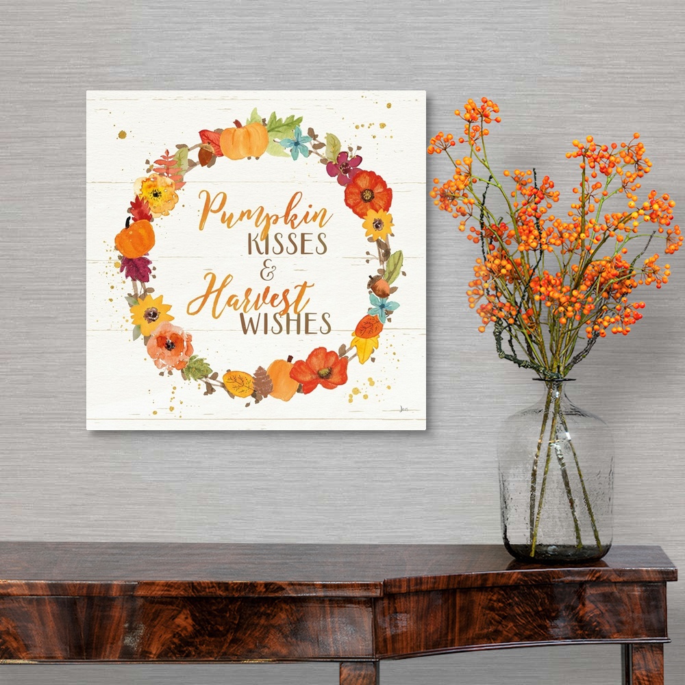 A traditional room featuring Decorative artwork of the words "Pumpkin Kisses and Harvest Wishes" surrounded by a wreath and a ...