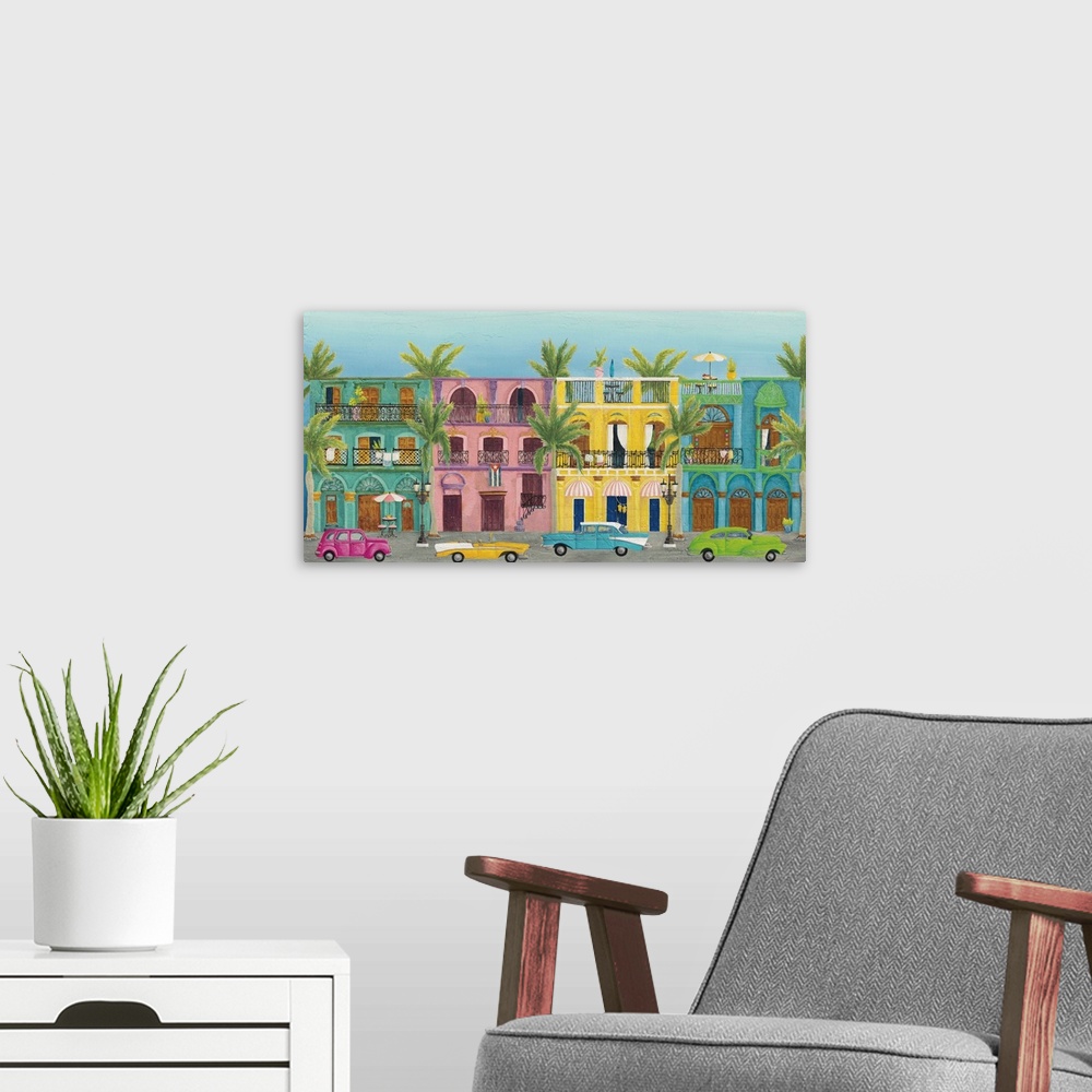 A modern room featuring Horizontal contemporary painting of colorful buildings in Havana with vintage cars parked out front.