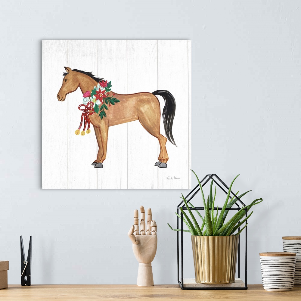 A bohemian room featuring Square artwork of a brown horse with a holiday wreath around her neck while on a white wood backg...