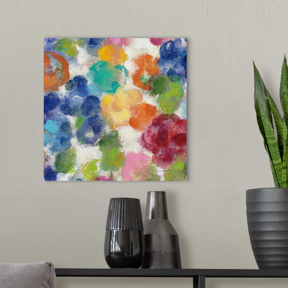 A modern room featuring Decorative artwork of whimsical abstract florals in bright colors.