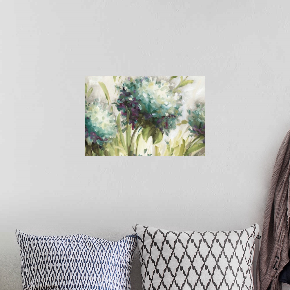 A bohemian room featuring Up-close painting of three blossoming balls of flower in a meadow.
