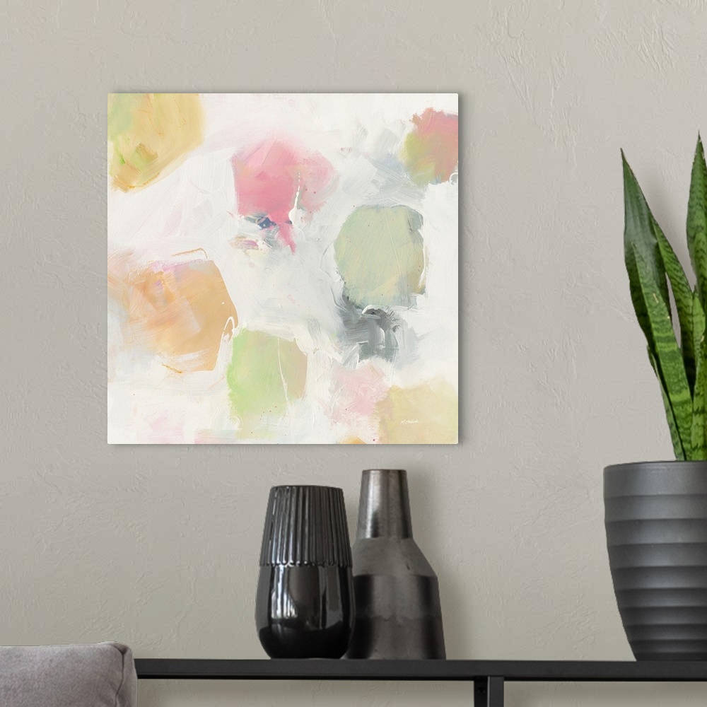 A modern room featuring Square abstract art with soft blotches of green, pink, orange, and yellow hues on a grey and whit...