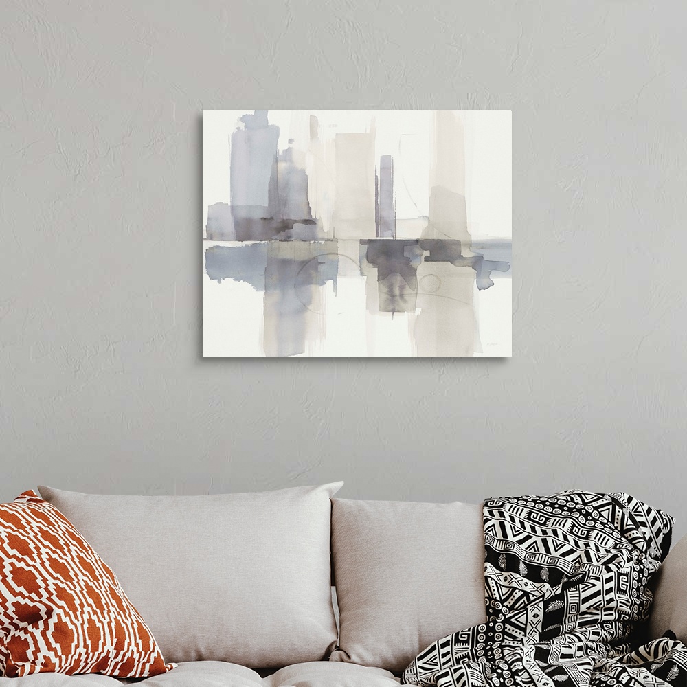 A bohemian room featuring Abstract gray, purple, and cream watercolor painting that resembles a skyline with a reflection.