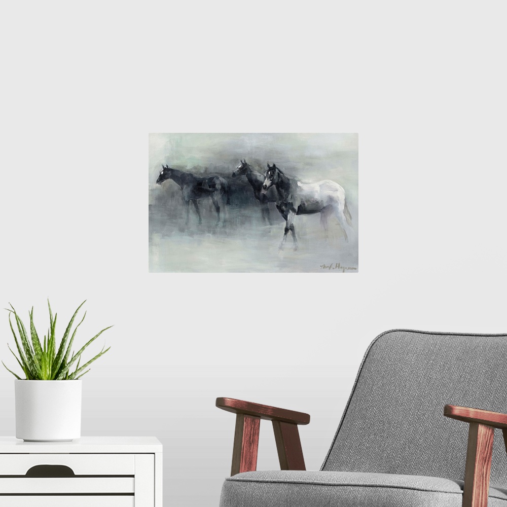A modern room featuring Contemporary painting of three horses walking through the fog.